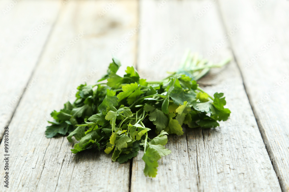 Parsley on grey wooden background Parsley on grey wooden background