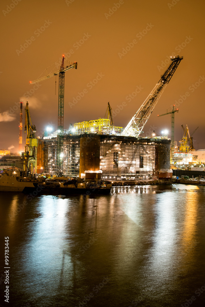 Night view of the renovation of an oil rig in the Gdansk Repair Shipyard