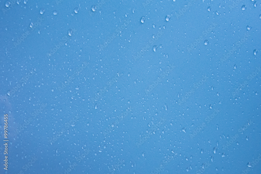 water drops on blue background water drops on blue background