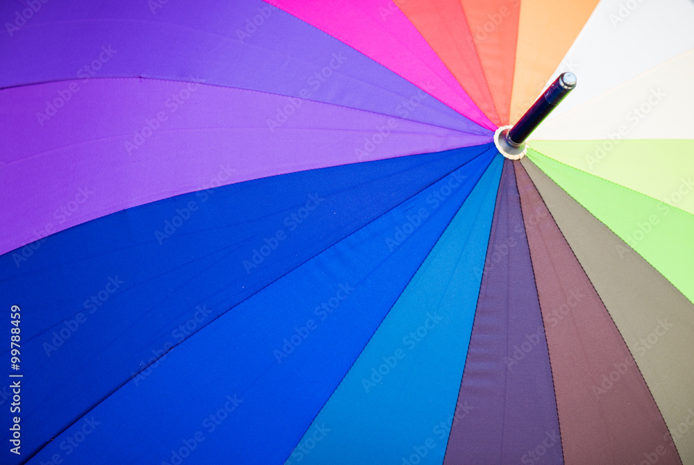 Close up view of multicoloured umbrella. Close up view of multicoloured umbrella.