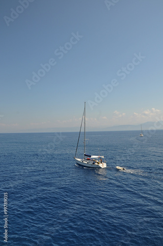 At dusk, traveling by boat to the sea