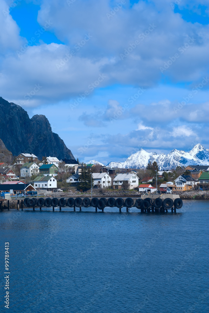 Pier of town Svolvaer on Lofoten islands in sunny day