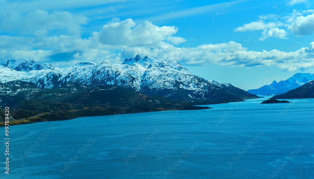 Seascape of Lofoten Islands in Norway with cloudy sky