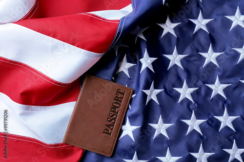 Quadro su tela Passport lying on American Flag background