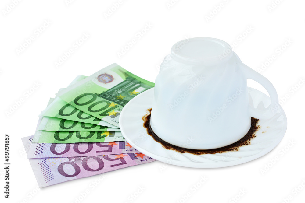 Euro bills and cup of coffee with grounds isolated Euro bills and cup of coffee with grounds isolated