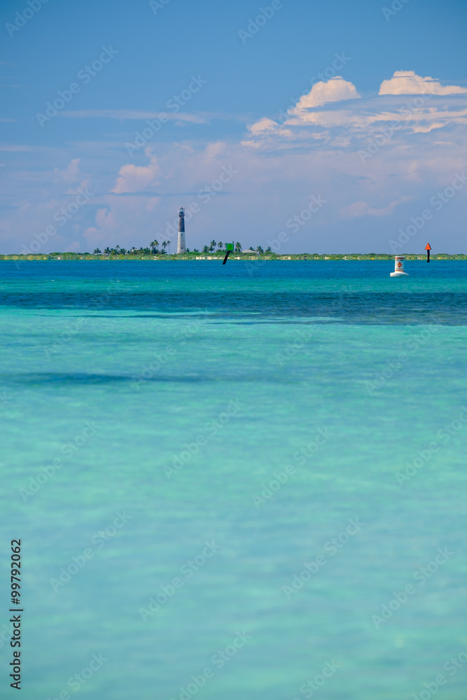 The lonely Loggerhead Key Lighthouse sits on an island surround