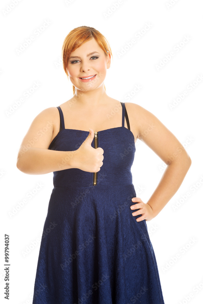 Happy overweight woman with thumbs up Happy overweight woman with thumbs up