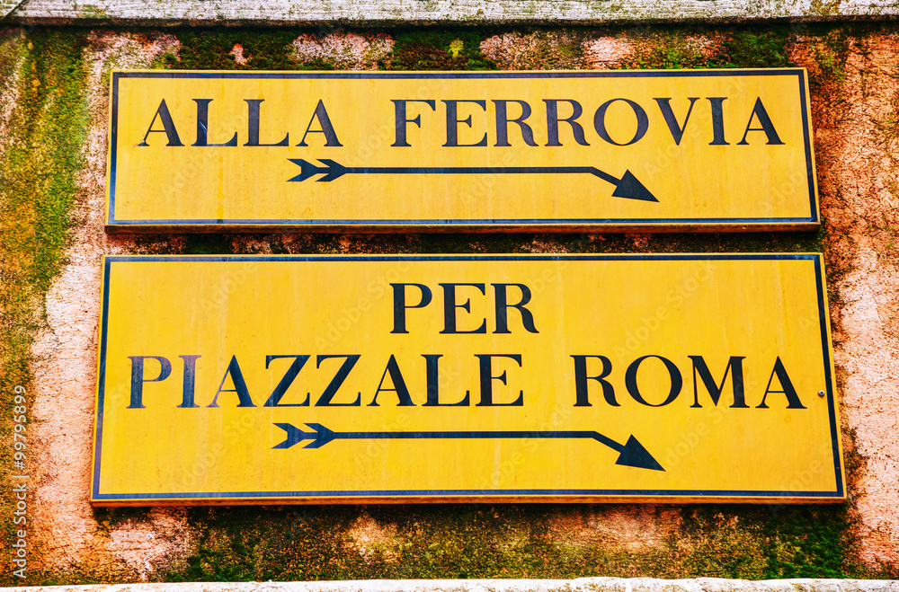 Alla Ferrovia and Piazzale Roma direction sign in Venice