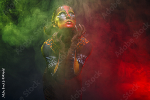 Bodypainting. Woman painted with ethnic patterns photo