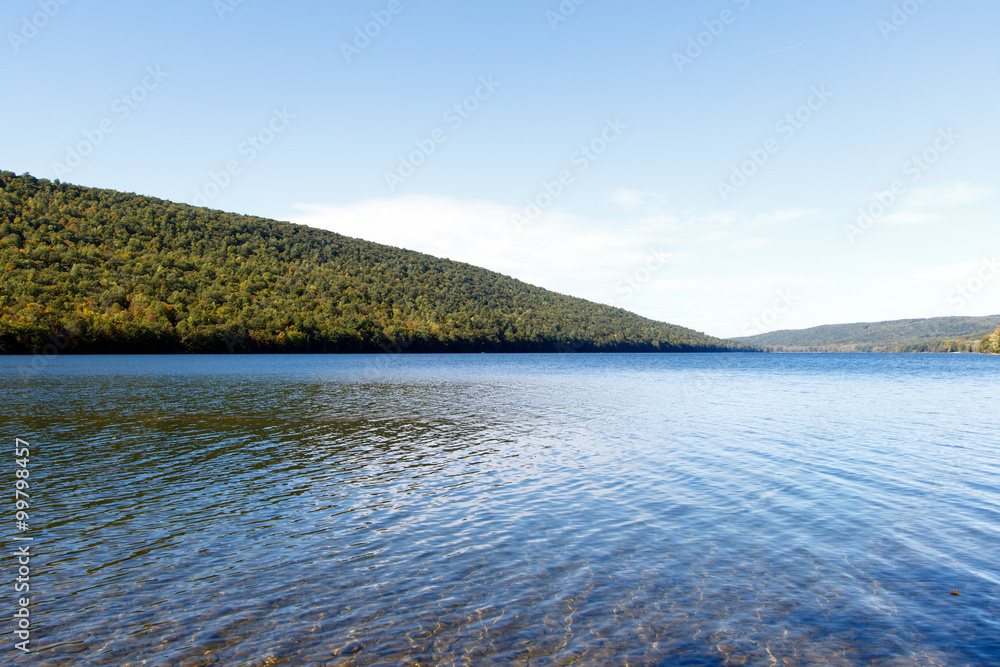 Obraz premium Color DSLR image of Canadice Lake, one of the New York Finger Lakes; horizontal with copy space for text