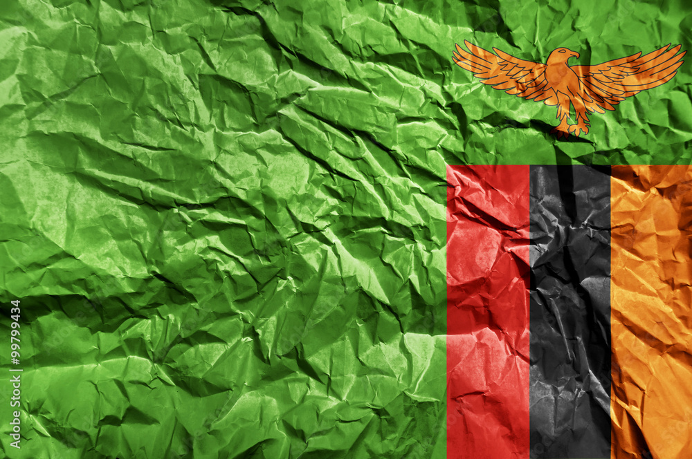 Zambia flag painted on crumpled paper background