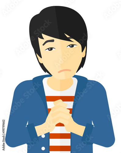 Regretful man with clasped hands.