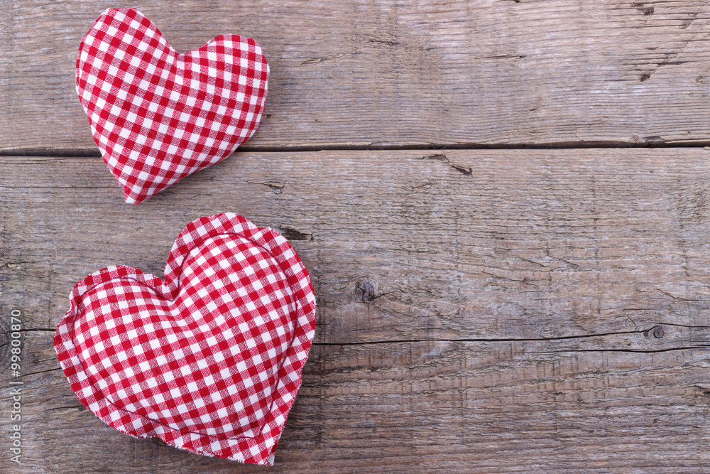 Fototapeta premium Handmade Hearts on wooden board, Valentines Day background