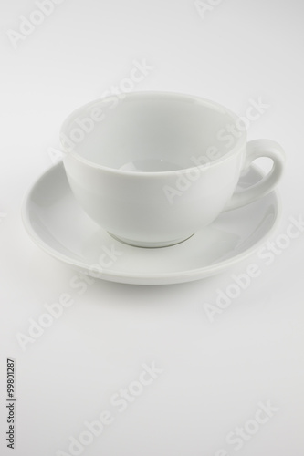 Empty coffee cup over white background