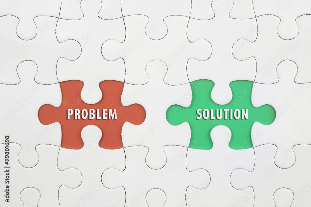 Jigsaw puzzle on color paper background with a word PROBLEM and SOLUTION Jigsaw puzzle on color paper background with a word PROBLEM and SOLUTION