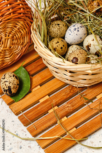 Quail eggs in basket. Easter. Delicacy.