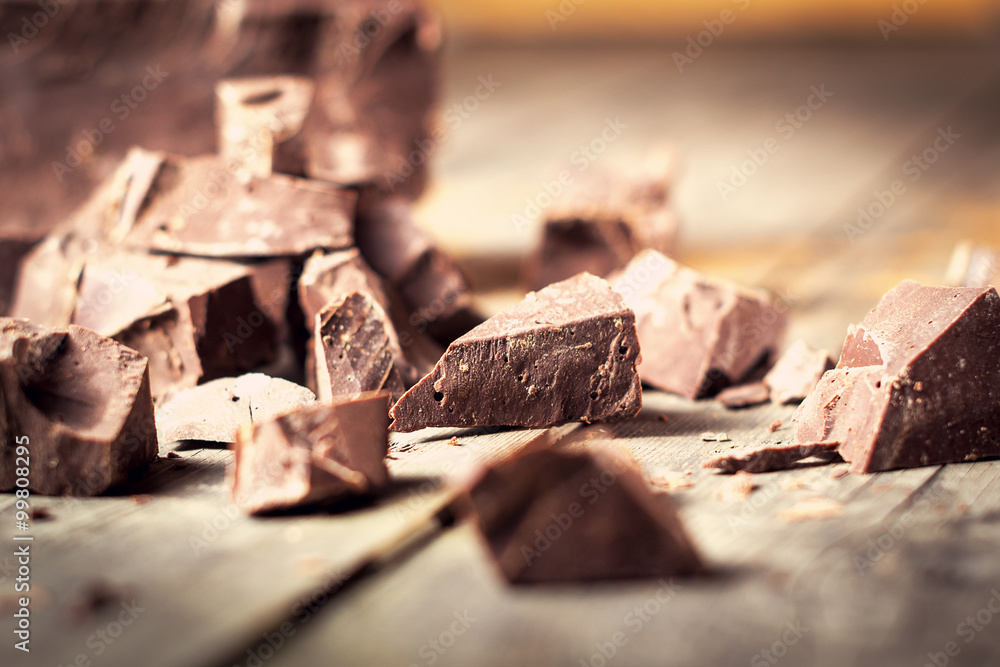 Dark chocolate pieces , chocolate candy, cocoa. With toning . Dark chocolate pieces , chocolate candy, cocoa. With toning .