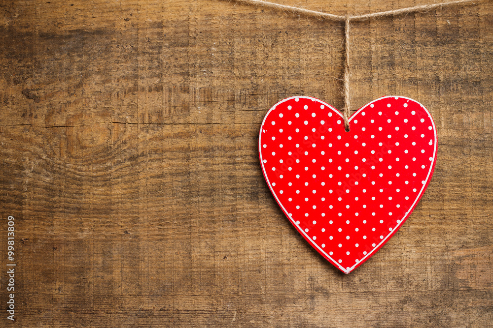 Red heart hanging on the clothesline for Valentines Day Red heart hanging on the clothesline for Valentines Day