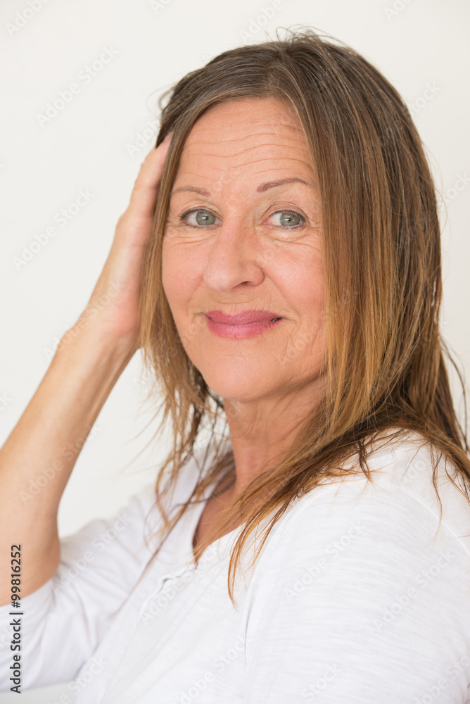 Confident mature woman posing happy Confident mature woman posing happy