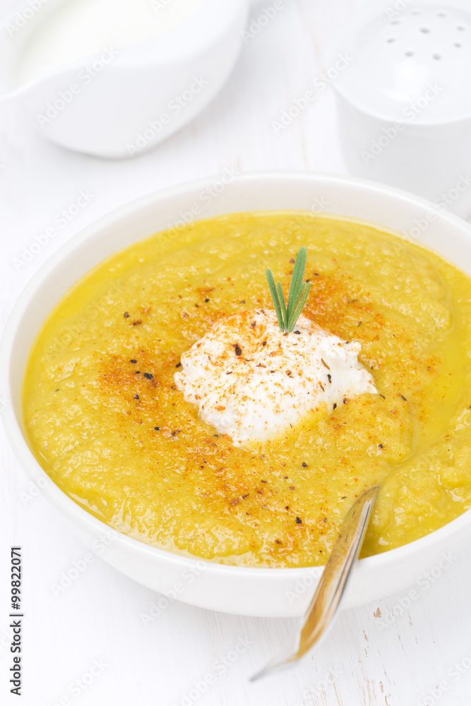 vegetable soup with cream and rosemary, close-up vegetable soup with cream and rosemary, close-up