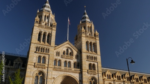 Pan and tilt across the front of the Natural History Museum in London. Shot in 4K on a sunny morning photo