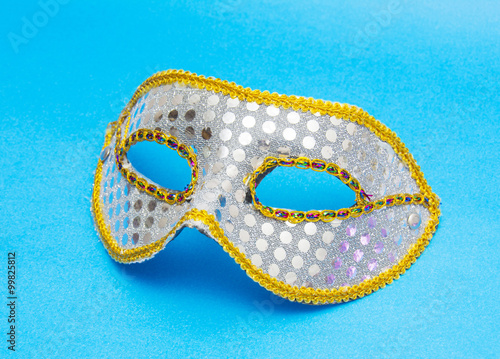 Carnival mask isolated on blue background