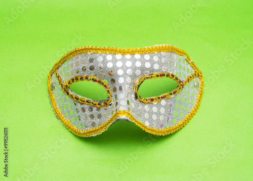 Carnival mask isolated on green background
