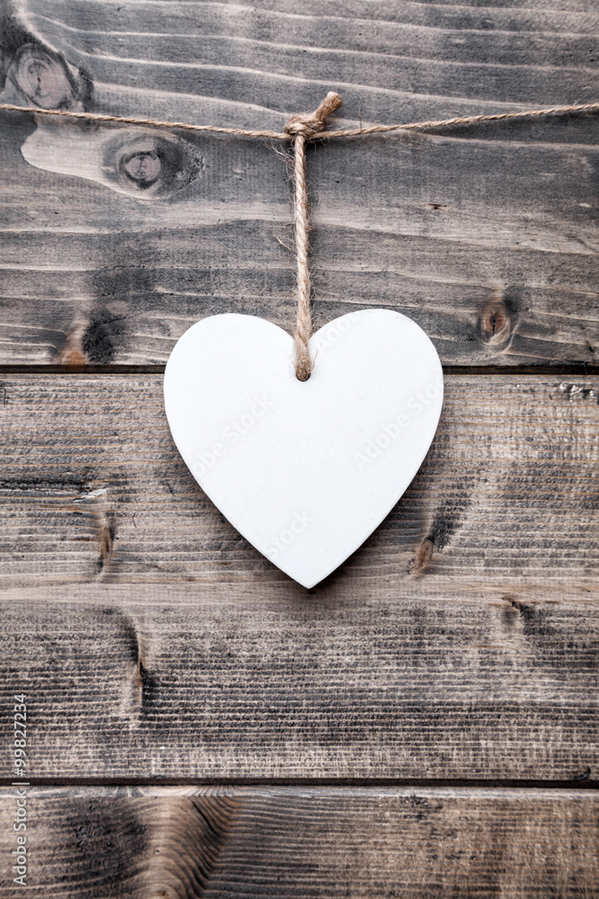 Love concept. Heart hanging on a string Love concept. Heart hanging on a string