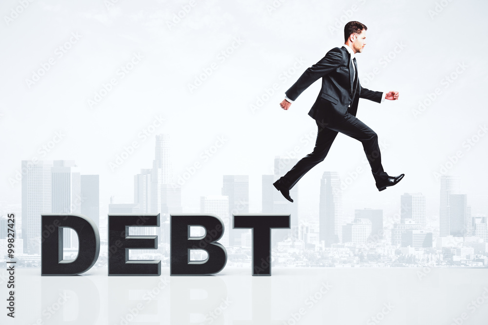 Bunkrupt concept with businessman running from debt word at city Bunkrupt concept with businessman running from debt word at city