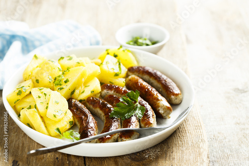 Fried sausages with potato salad