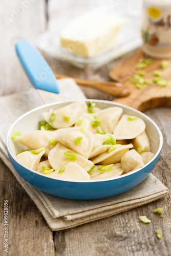 Dumplings with butter and onion