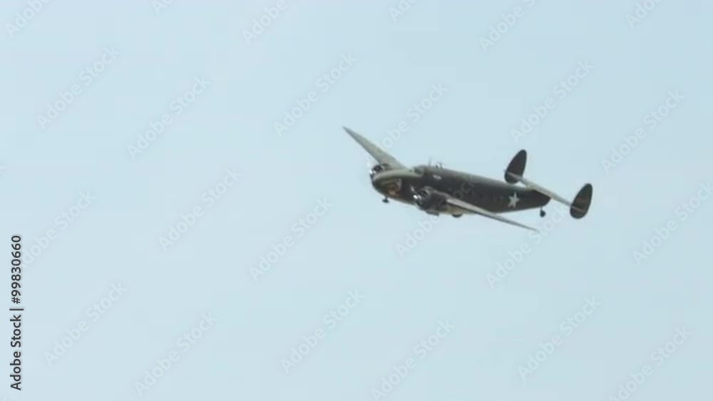 Historic World War II military transport aircraft, Lockheed C-60 Lodestar, flying in cloudy sky. Recorded in 4K, ultra high definition. Historic World War II military transport aircraft, Lockheed C-60 Lodestar, flying in cloudy sky. Recorded in 4K, ultra high definition.