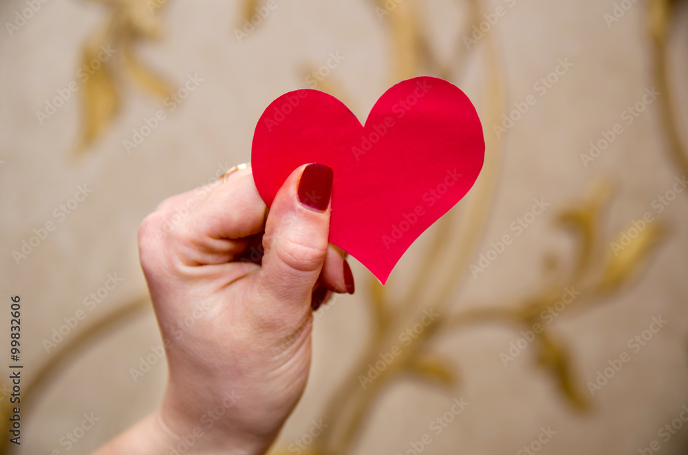 Fototapeta premium paper hearts on woman hand