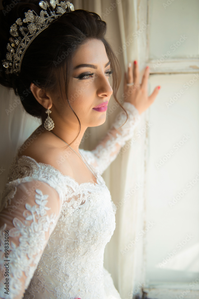 Wedding portrait beautiful fiancee in white dress, soft light Wedding portrait beautiful fiancee in white dress, soft light