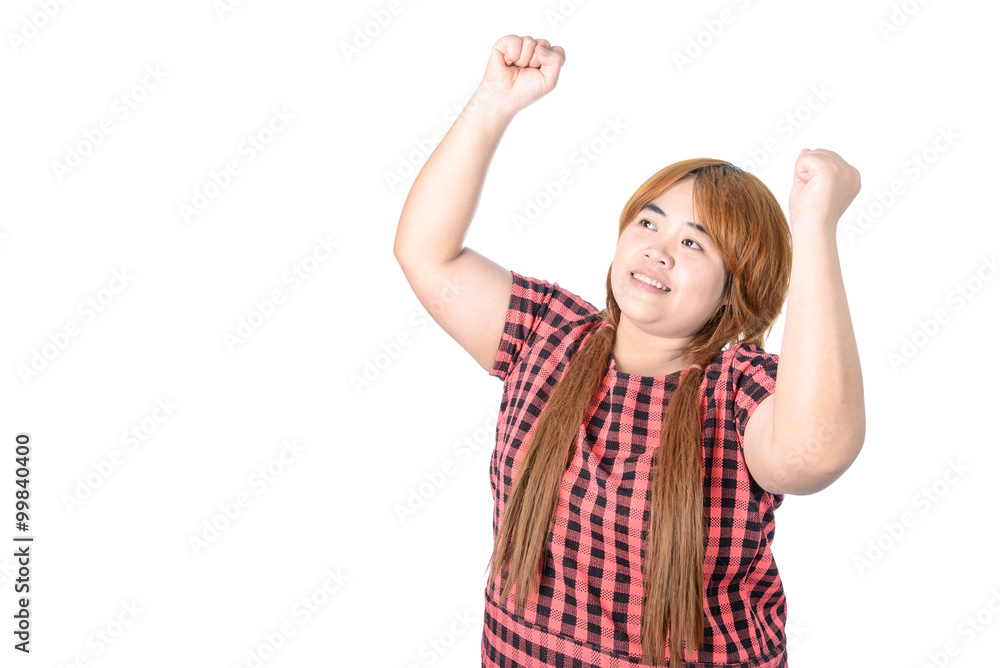 Successful plump woman punching the air with her fists in air, s Successful plump woman punching the air with her fists in air, s