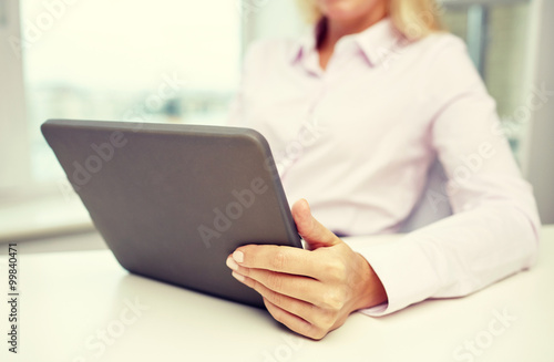 close up of businesswoman hands with tablet pc