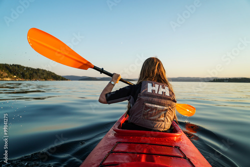 A girl Canoeing in the fjord of Oslo
