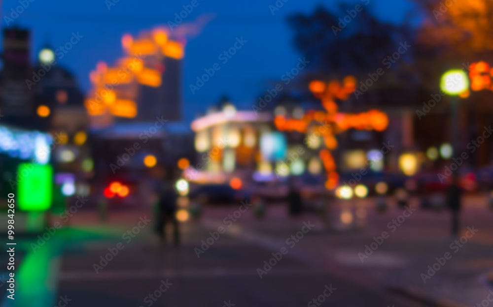 Blurry background - evening illumination in central part of Dnepropetrovsk city at winter time