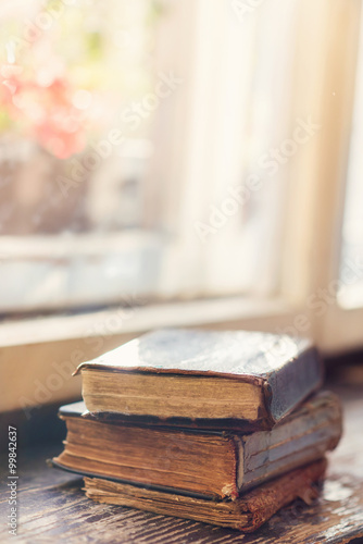 Old books on windowsill
