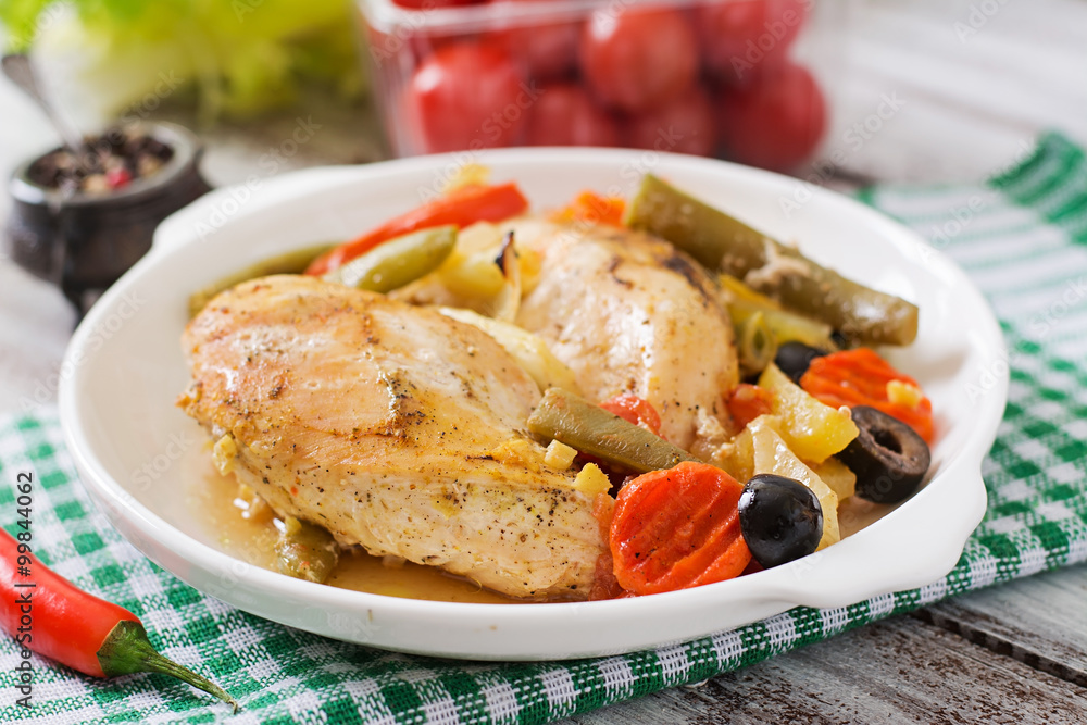Baked, diet and healthy a chicken fillet with vegetables Baked, diet and healthy a chicken fillet with vegetables