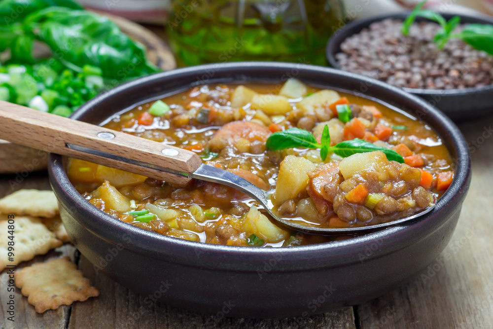 Homemade soup with lentils and sausages Homemade soup with lentils and sausages