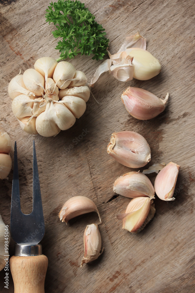 heap garlic on wood background heap garlic on wood background
