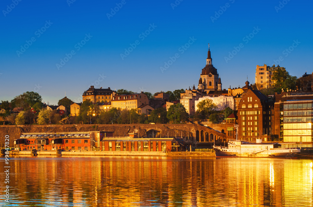 View of the famous scandinavian and north european city Stockholm - the capital of Sweden at sunrise with water reflection