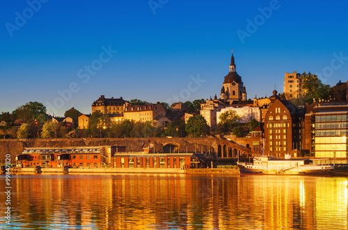 View of the famous scandinavian and north european city Stockholm - the capital of Sweden at sunrise with water reflection © Roxana