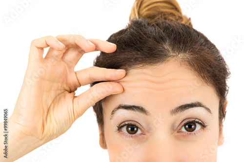 Wrinkles on female forehead