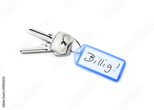 Schreibtisch von oben mit "Billig" Text