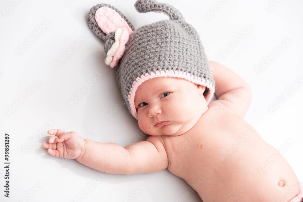 A cute newborn little baby girl. Use it for a child, parenting or love concept. A cute newborn little baby girl. Use it for a child, parenting or love concept.