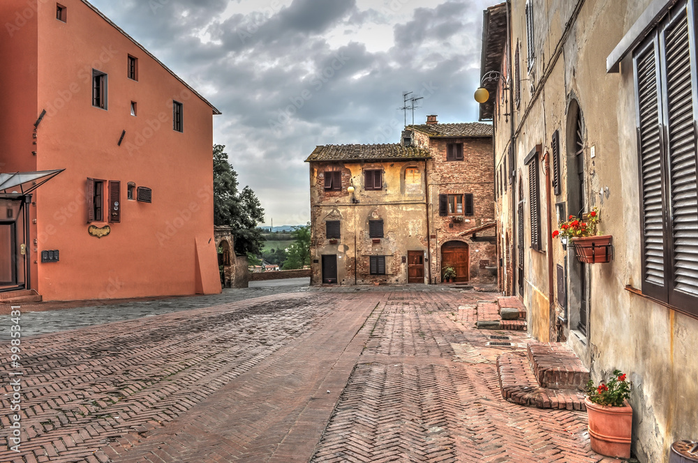 Fototapeta premium old paved street in Certaldo