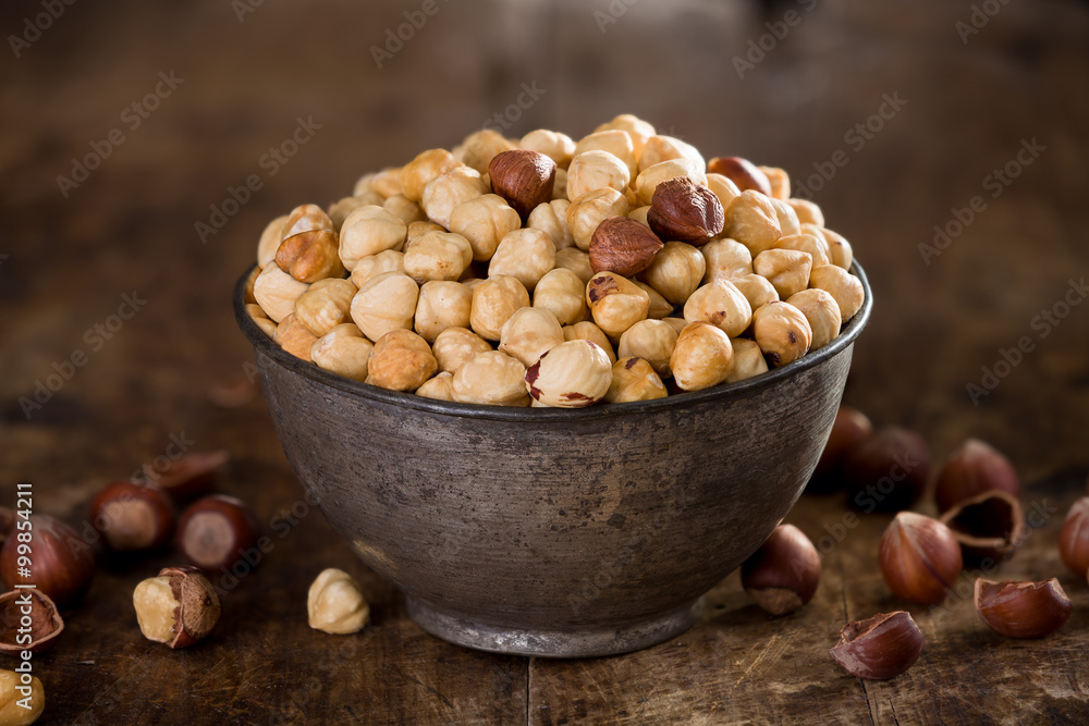 Hazelnuts on wood background Hazelnuts on wood background