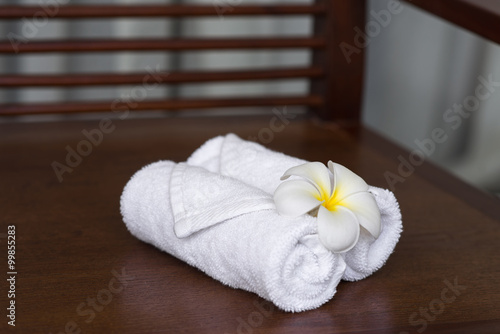 Spa composition of towels and flowers